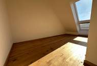 Erstbezug | Sonnige 3-Zi-DG-Wohnung mit Wien-Blick + 8m² Balkon | Klima | Lift