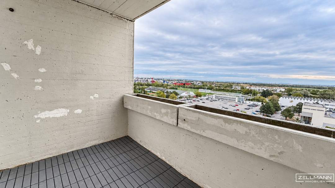 Ihr Logenplatz über der Südstadt – 3 Zimmer, große Loggia und herrlicher Weitblick im 9. Liftstock! | ZELLMANN IMMOBILIEN