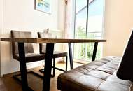 Helle, teilmöblierte Eigentumswohnung mit sonnigem Balkon und Tiefgaragenparkplatz.
