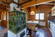 „Wohnen im Einklang mit der Natur – Stilvolles Holzhaus in traumhafter Ruhelage auf unverbaubarem Grundstück“