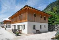 Etabliertes Ferienhaus-Ensemble am Millstätter See. Zwei moderne Häuser mit bestehender Vermietung. Investment.