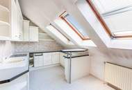 Dachgeschoßwohnung mit Balkon und Ausblick in Gründerzeithaus