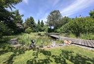 Stilvolles Einfamilienhaus mit Schwimmteich