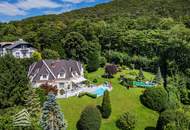 Beeindruckende Villa mit gepflegtem Garten und Pool als Investment