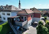 Saniertes Einfamilienhaus mit Sauna, Doppelcarport, zwei Garagen und Nutzwasserbrunnen in zentraler Lage