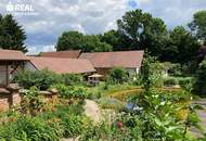 Gepflegte Dachgeschosswohnung mit gemeinsam nutzbaren Schwimmteich und großem Garten !