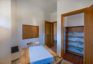 Kärntner Wohncharme in Seenähe – 5-Zimmer-Wohnung mit Kachelofen & Balkon