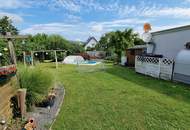 Einfamilienhaus mit Pool und großem Garten in verkehrsgünstiger Lage