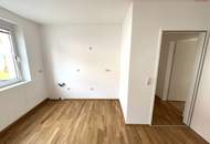 Moderner Rückzugsort für Familien & Naturfans: helle Wohnküche, 3 Schlafzimmer und ein hochwertiges Bad vereinen Komfort, Stil und urbanes Lebensgefühl auf kompaktem Raum!