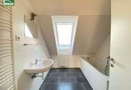 Moderne Dachgeschosswohnung mit großer Terrasse nahe Arthaberplatz in ruhiger Seitengasse! Hohe Decken und Traumbad mit Fenster