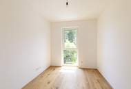 Erstbezug-Dachgeschosswohnung – TG-Stellplatz inklusive