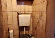 RENOVIERUNGSBEDÜRTIGES EIN-ZWEIFAMILIENHAUS IN ZENTRALER LAGE