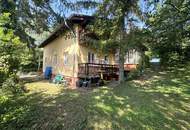 Großzügiges Einfamilienhaus mit Pool, Wintergarten und Doppelgarage mitten im Grünen!
