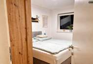 Neubau-Wohnung mit 3 Zimmern, 90 m² Garten und 2 Parkplätzen in moderner Siedlung in Wasendorf