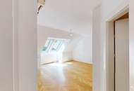 Elegante Dachgeschosswohnung mit Gartenblick, Terrassen und Garage
