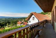 Einfamilienhaus mit Einliegerwohnung, Garage, Carports und Ausblick!