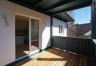 Reizende 3-Zimmer-Wohnung mit 2 Balkonen, gartenseitiger Veranda und Garagenplatz