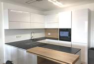 Moderne Anlegerwohnung mit Loggia und Tiefgaragenplatz