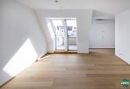 Ruhelage: Moderne DG-Wohnung mit Balkon und perfekter Anbindung