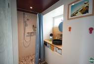 Flexibel gestaltbares Büro mit großen Glasfronten am Donaukanal