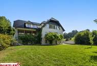 LIEGENSCHAFT IN PÖRTSCHACH MIT BLICK AUF DEN WÖRTHERSEE