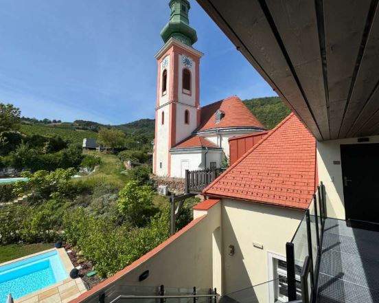 Rückzugsort mit Historie - Luxus-Dachgeschosswohnung im Kahlenbergerdorf