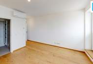 Wohnen mit Weitblick: Neuwertige Dachgeschosswohnung mit Balkon in Wien-Brigittenau