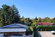 EXKLUSIVES SEEHAUS AM NEUFELDER SEE – MODERNES WOHNEN MIT PRIVATEM WASSERZUGANG
