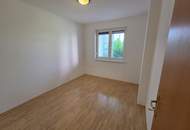 Barrierefreie Zweizimmerwohnung mit Eigengarten und Tiefgaragenstellplatz!