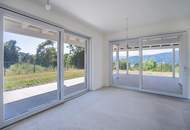 Moderne, Erstbezug-Gartenwohnung mit Traumblick auf den Wörthersee! Touristische Nutzung möglich!