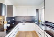 Moderne Dachgeschoss-Maisonette in Wien-Mauer mit zwei Balkonen, Garage und Liftzugang auf beiden Ebenen | ZELLMANN IMMOBILIEN