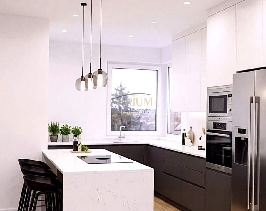 Dachgeschosswohnung in Niedrigenergiebauweise und 23m² Terrasse mit spektakulärem Fernblick.