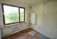 Sanierungsbedürftiges Einfamilienhaus mit Fernsicht in Grünruhelage!