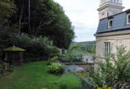 Exklusives Dachgeschoß-Juwel in Turmvilla mit großem Gartenanteil