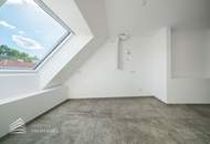 Erstbezug! Elegante 3-Zimmer Dachgeschosswohnung mit Balkon
