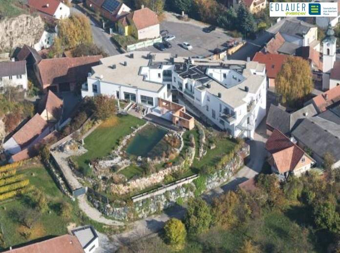 Exklusives Penthouse mit Eigengarten und Schwimmteich!