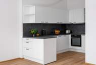 ERSTBEZUG - Helle 2-Zimmer-Wohnung mit Balkon &amp; Eigengarten