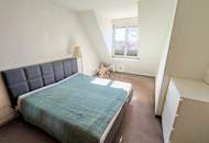 Zentrumsnah wohnen, Ruhe genießen – 3-Zimmer-Dachgeschoß-Wohnung mit Gartenblick