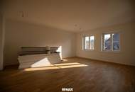 Neubauwohnung im Stadtzentrum mit Ausbaupotenzial &amp; Dachterrasse
