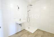 Zentral - modern - hell: Perfekte 2-Zimmer-Wohnung mit Balkon im Erstbezug in grüner Anlage