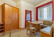 DAS INVESTMENT IN BESTLAGE! Wohnung sowie Geschäftslokal, Praxis oder Büro- 2 Garagen im Innenhof