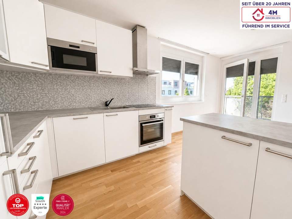 Moderne 3-Zimmer-Neubauwohnung mit Balkon ins Grüne
