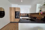 BALKONWOHNUNG MIT TIEFGARAGE IN TOPLAGE! BRILLIANTER 3-ZIMMER GRUNDRISS MIT FERNBLICK UND RUHELAGE! NAHE U1 KAGRANER PLATZ.