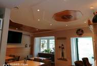 Langfristig vermietetes Café mit Garage!