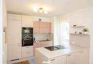 NEUBAU | Hochwertige Gartenwohnung mit traumhafter Küche, Terrasse und Garage in ruhiger Grünlage!