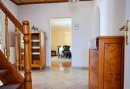 Haus mit Seeblick in grüner Ruhelage