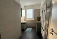 Hochwertige Gartenwohnung inkl. Tiefgaragenstellplatz