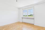 Obergeschoss Eigentumswohnung mit Gartenanteil in TOP LAGE