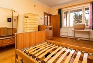 Geräumiges Haus mit Potenzial und großem Garten in Theiß !