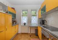 FREUNDLICHE WOHNUNG MIT GARTENNUTZUNG UND PARKPLATZ